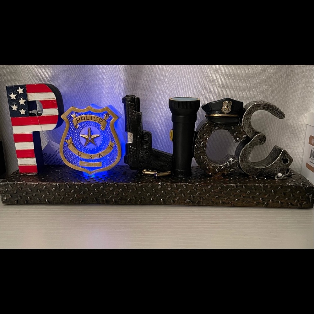 Office decor “POLICE” sign lights up